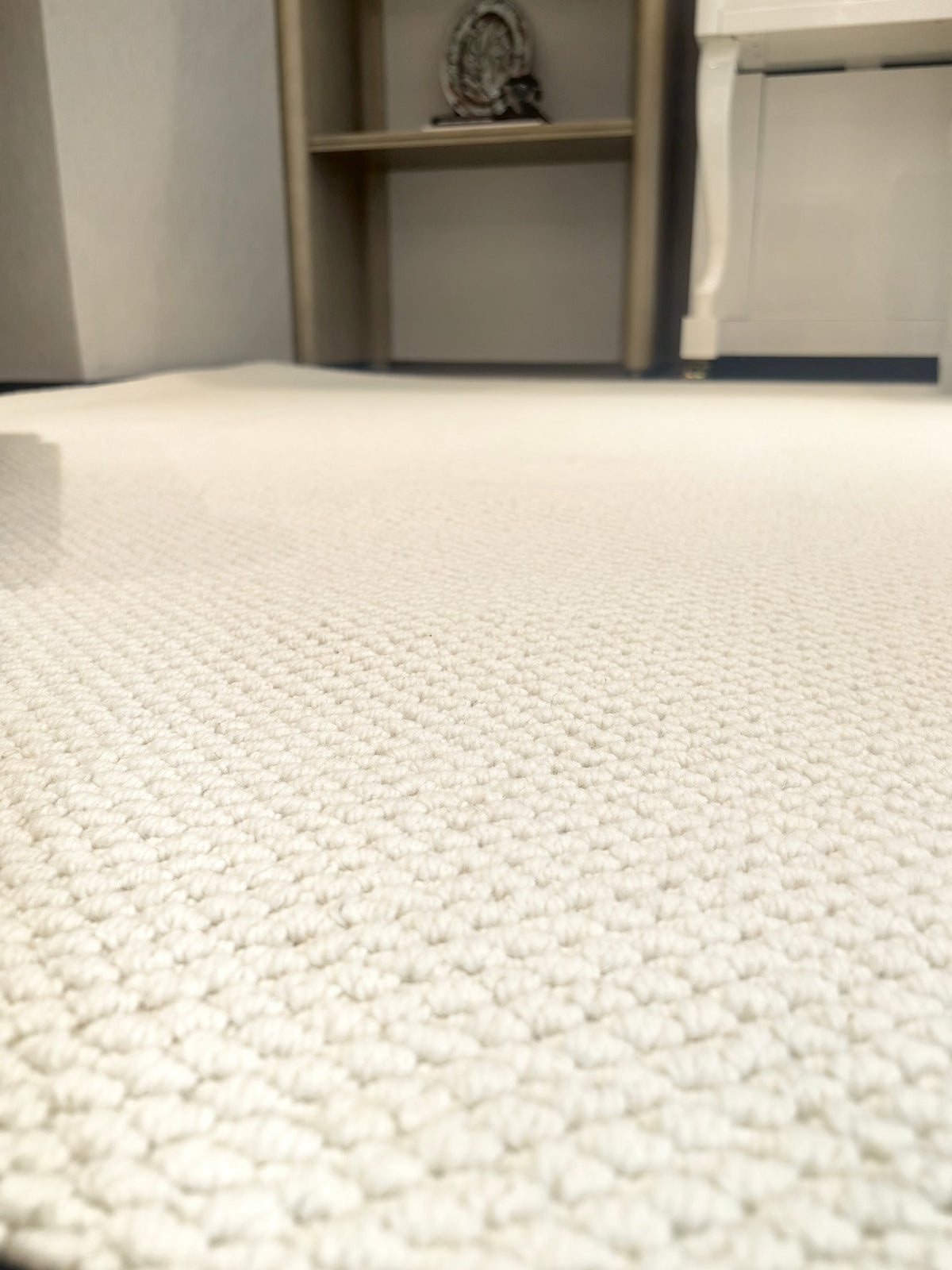 Low view across Halcyon's cream loop texture.