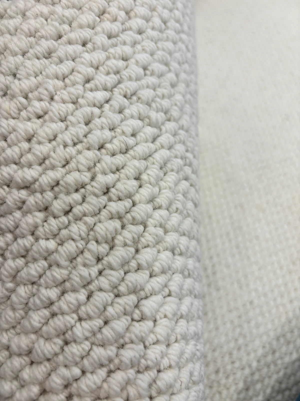Close-up of Halcyon folded surface showing its large cream pebbled loops.